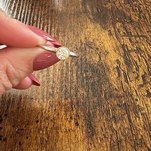 Elegant Silver and Gold Ring with Clear Stone